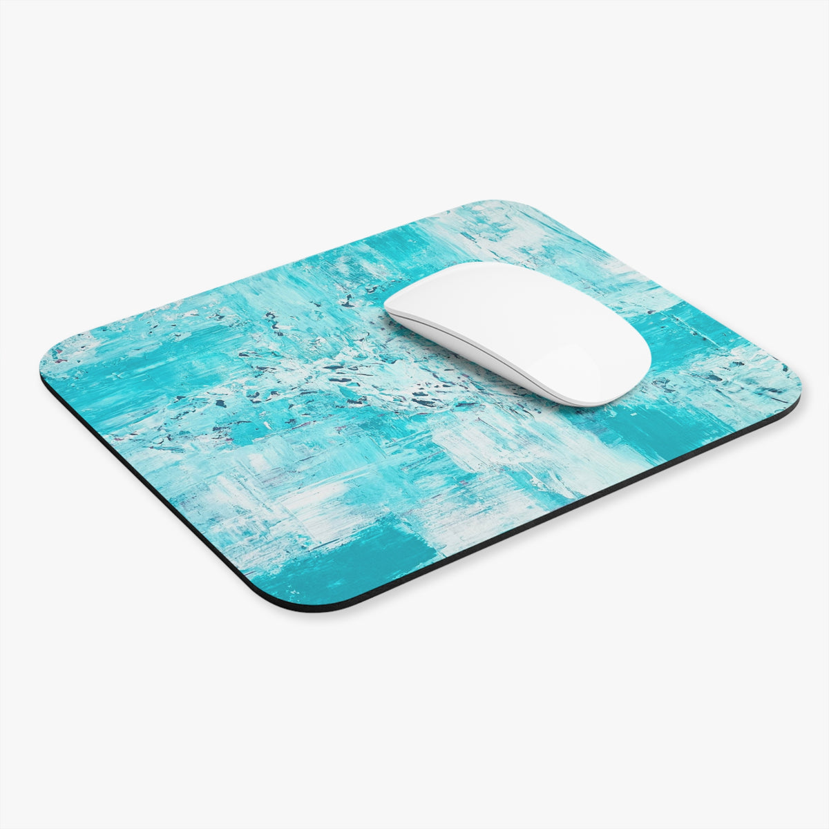 Turquoise rectangle mouse pad with rounded corners and white mouse on top
