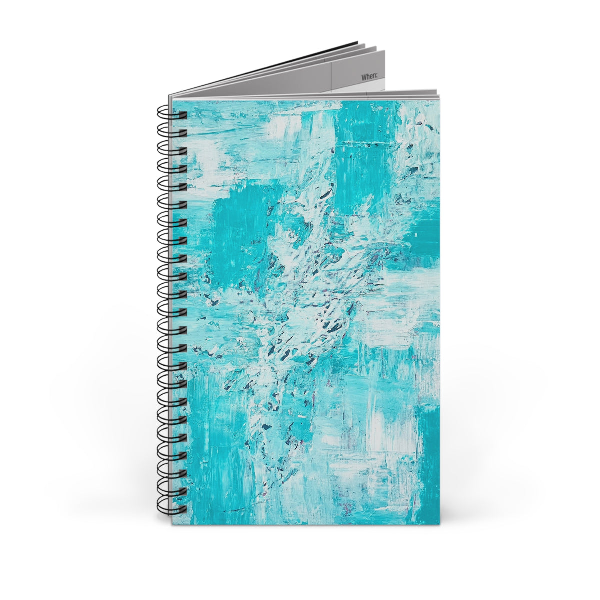 Turquoise abstract spiral journal with teal abstract cover and black spiral binding