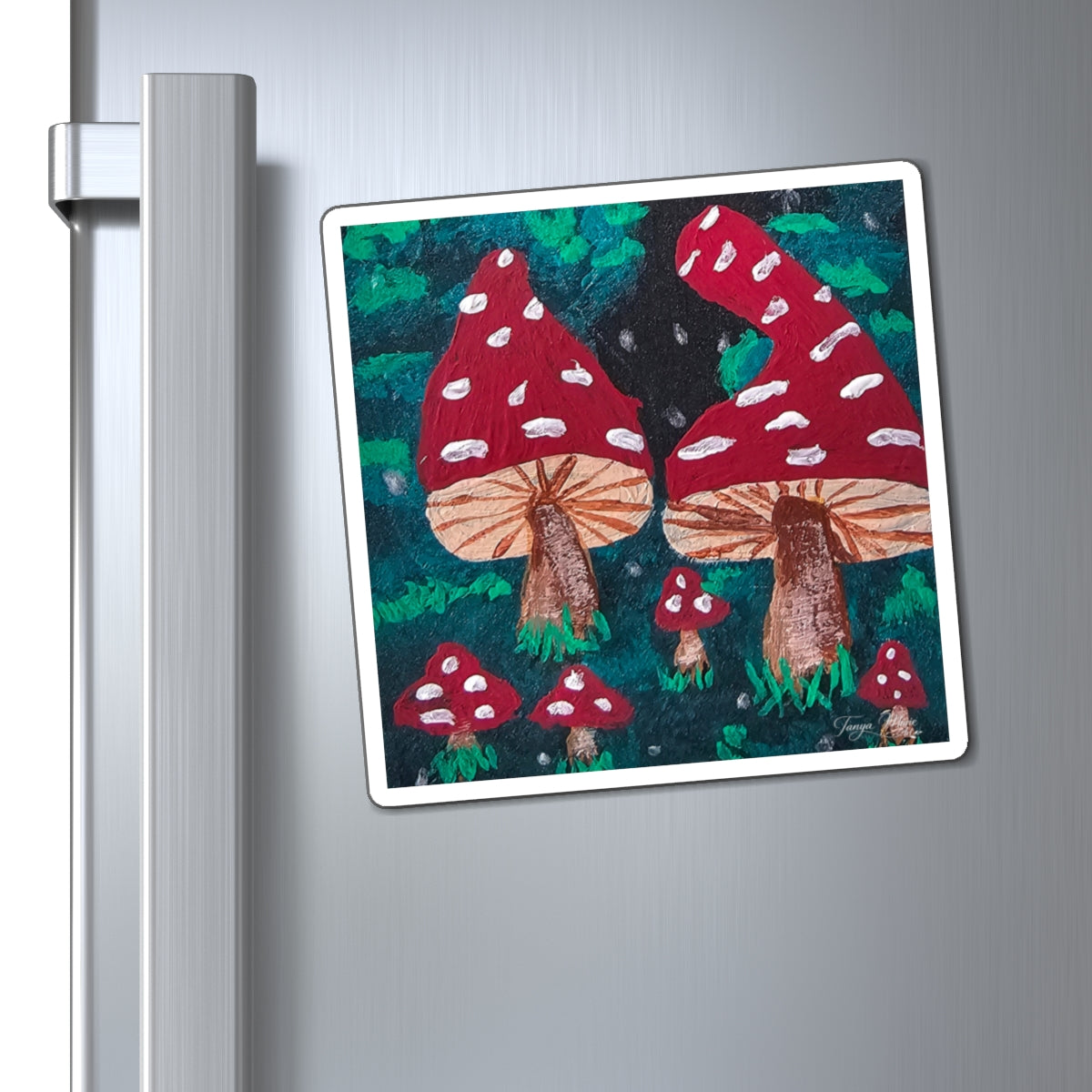 Framed forest toadstool refrigerator magnet showing red caps with white spots and brown stems