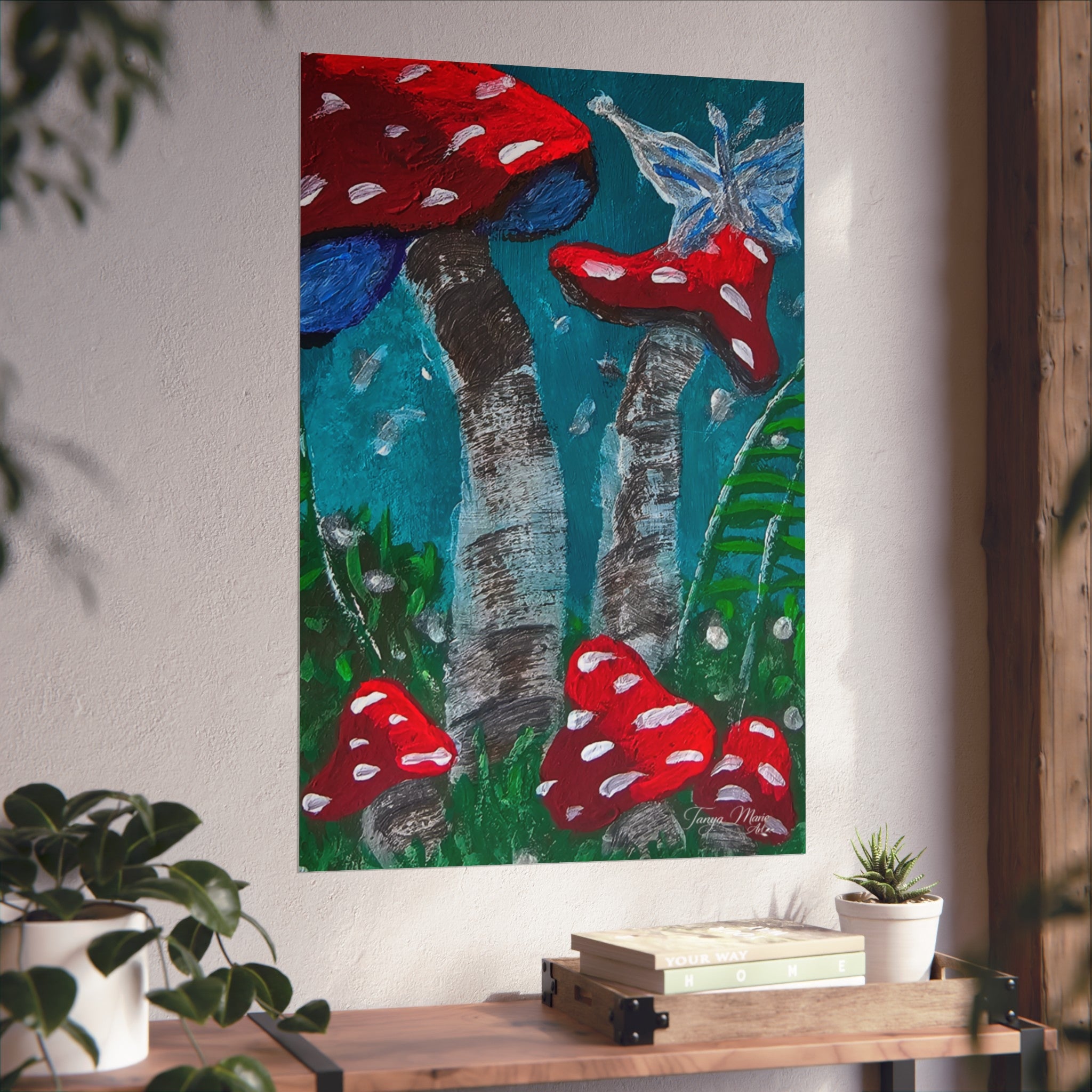 Mushroom garden poster on a wall with red speckled toadstools and pale blue butterfly