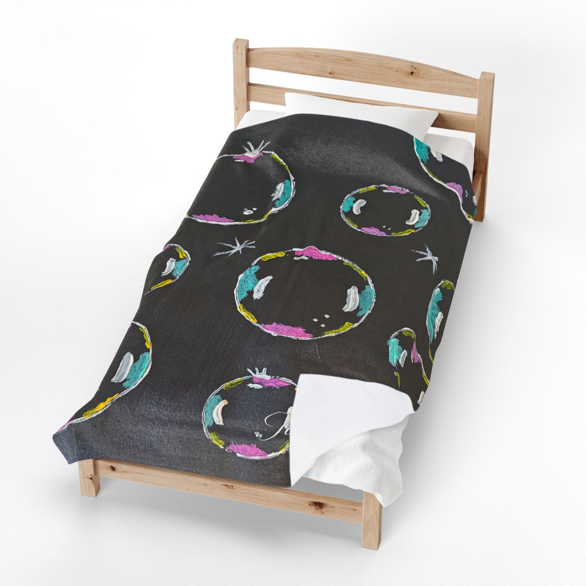 Black velveteen plush blanket with colorful bubble ring and star pattern