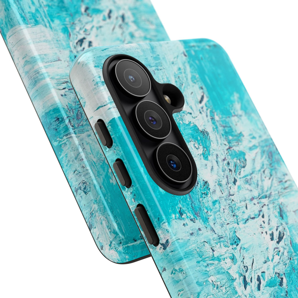 Turquoise marble case close-up with abstract ocean blue print and triple-lens camera area