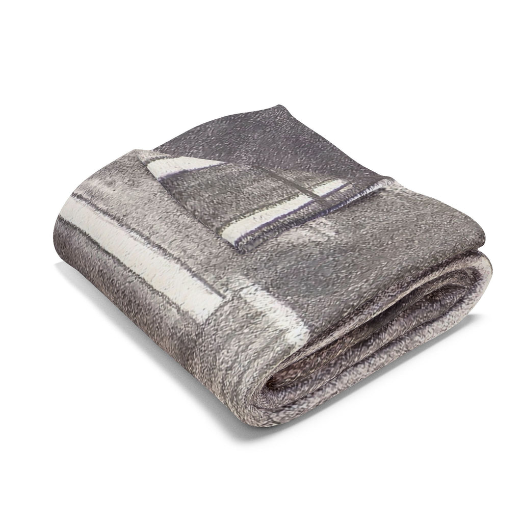 Gray acoustic guitar sketch fleece blanket, neatly folded with guitar stripe design