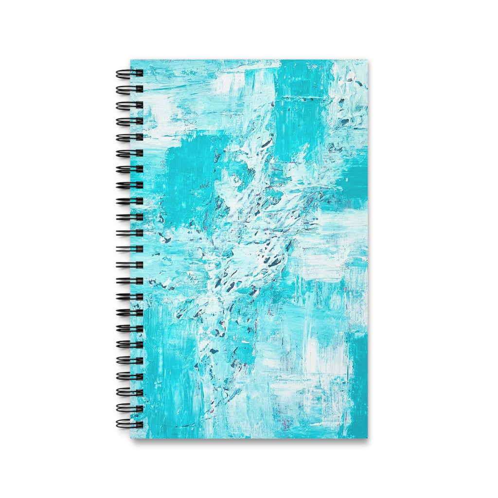 Turquoise abstract spiral journal with black coil rings and textured cover art.