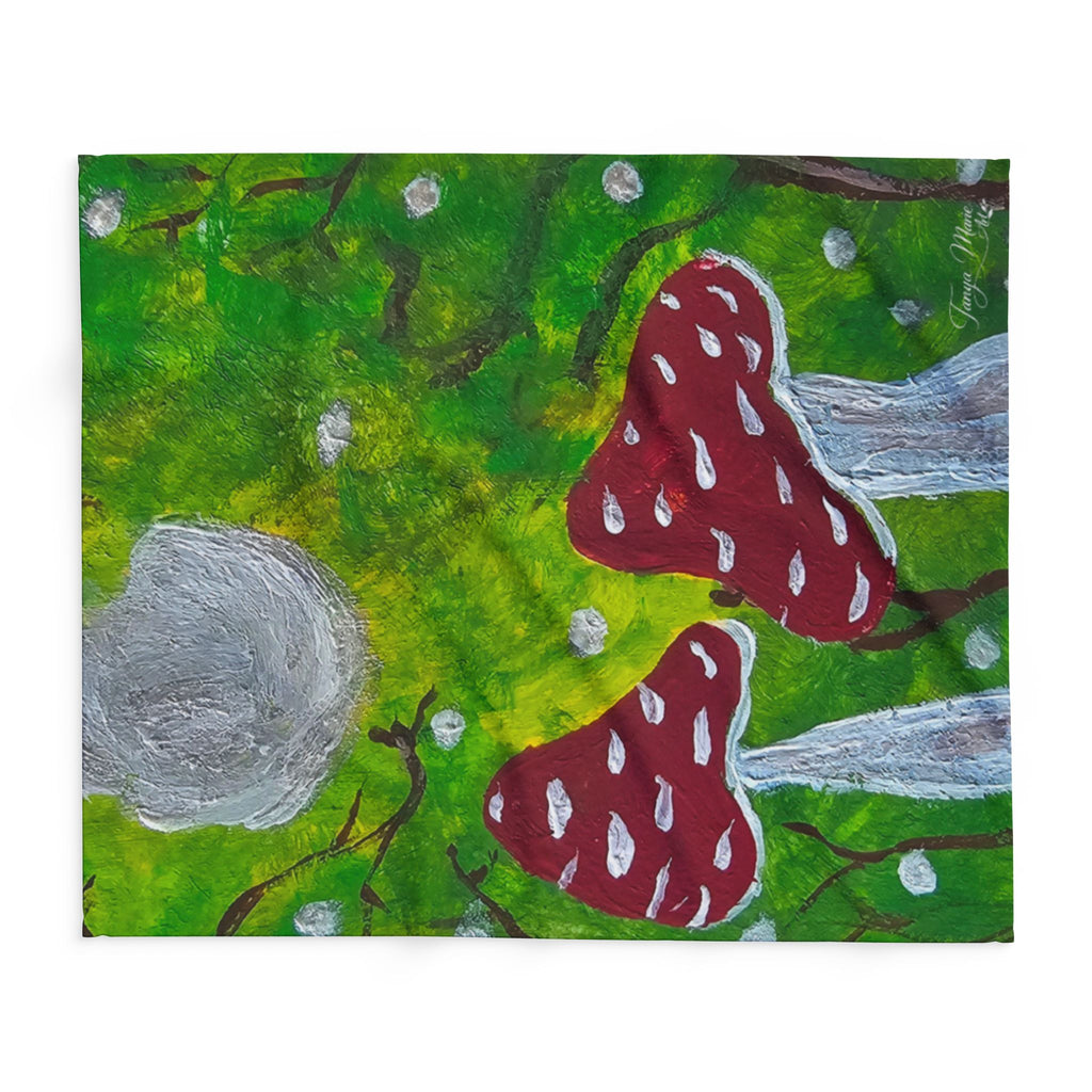 Fleece blanket featuring two red mushrooms, green background, and a gray moon