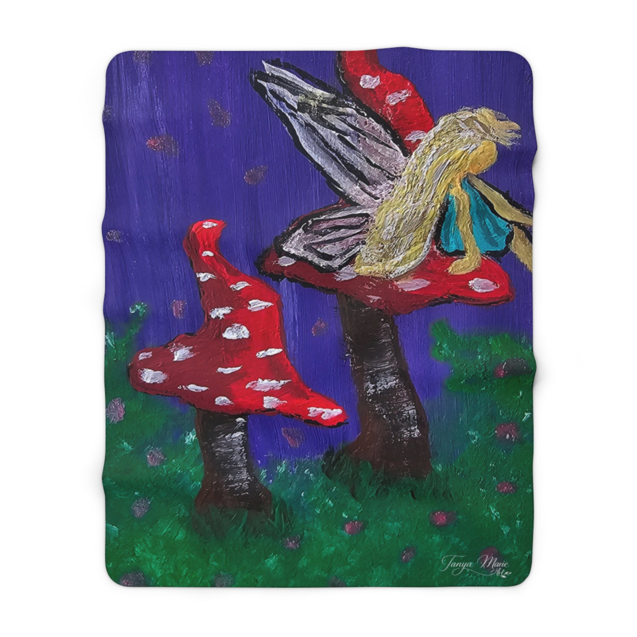 Sherpa fleece throw blanket with red mushroom shapes and fairy tree on blue and green