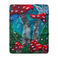 Sherpa blanket, square view, blue-green mushroom scene with red toadstools and white spots.