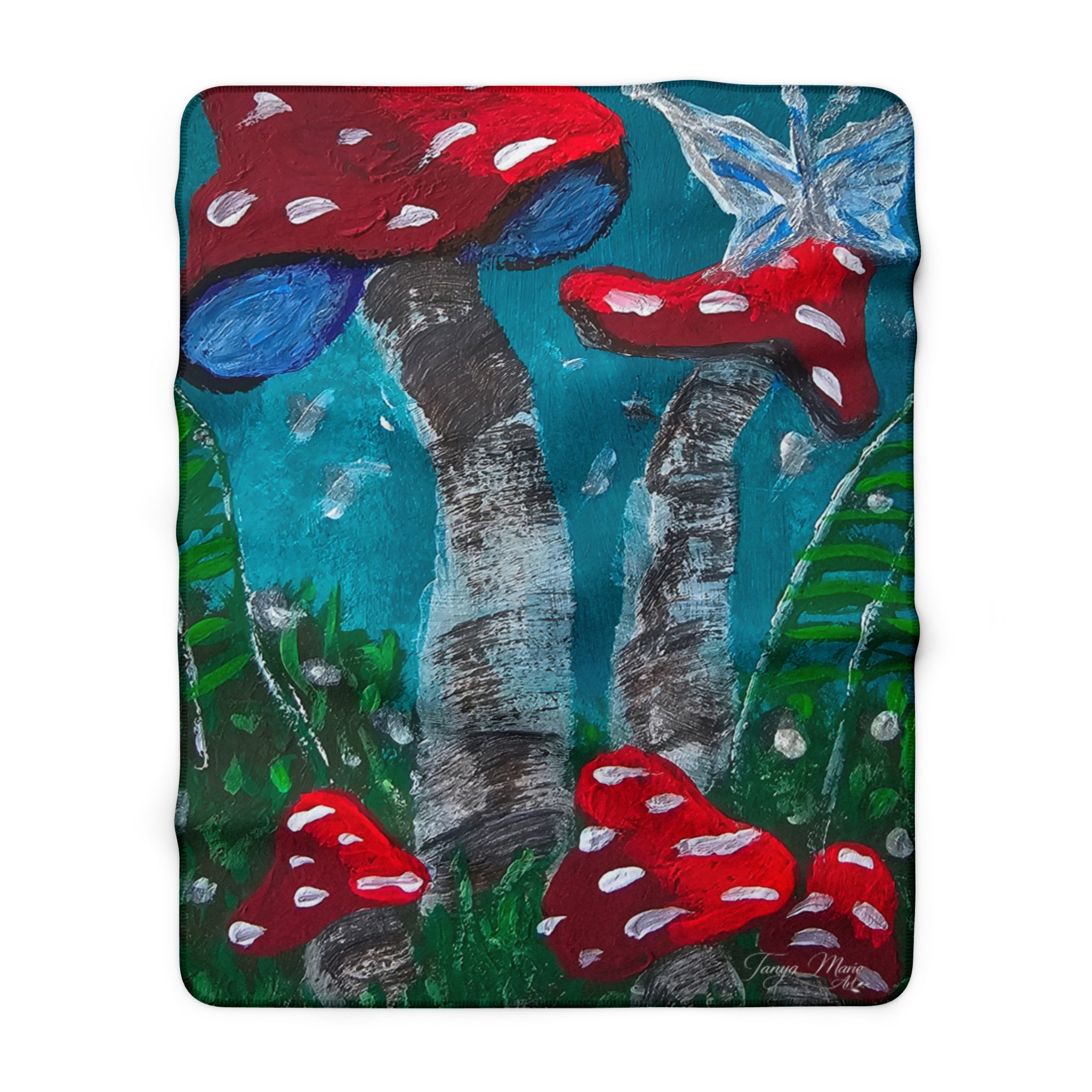 Sherpa blanket, square view, blue-green mushroom scene with red toadstools and white spots.