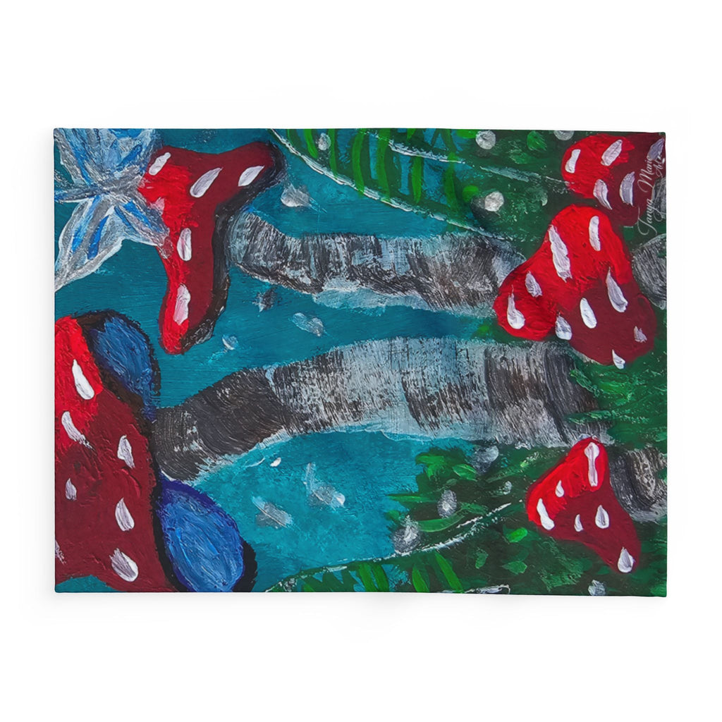 Fleece blanket with mushroom forest scene, red mushrooms on dark tree trunks and blue sky