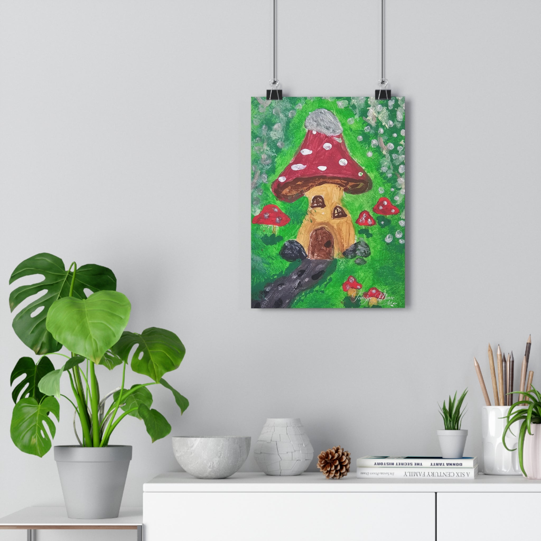 Fairy garden wall art print with red spotted mushroom house and green background