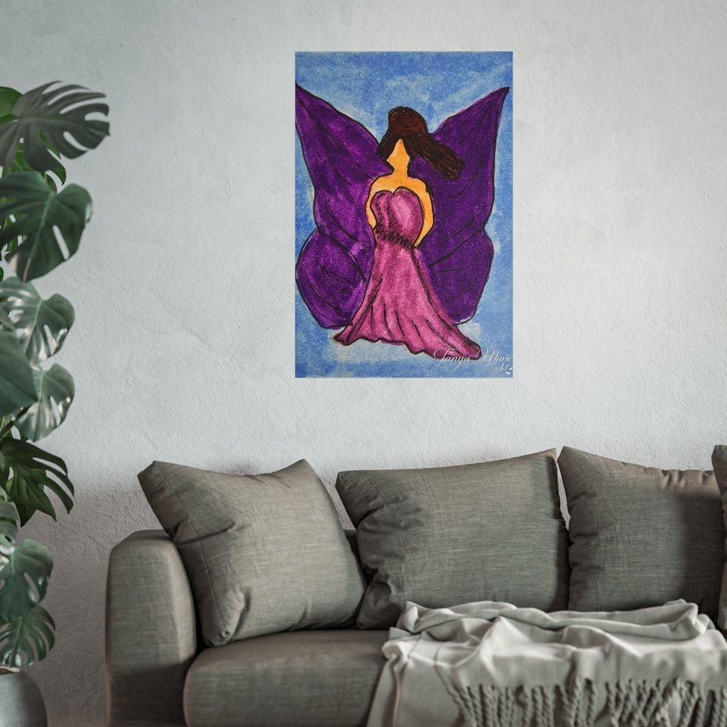 Purple wings angel wall art print on a wall above a gray sofa with a plant nearby