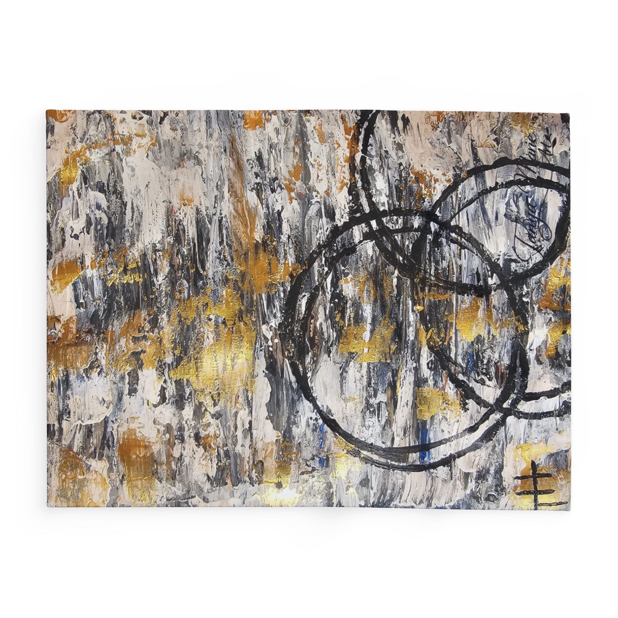 Abstract fleece blanket with grey, gold, and black circle scribbles and splatter