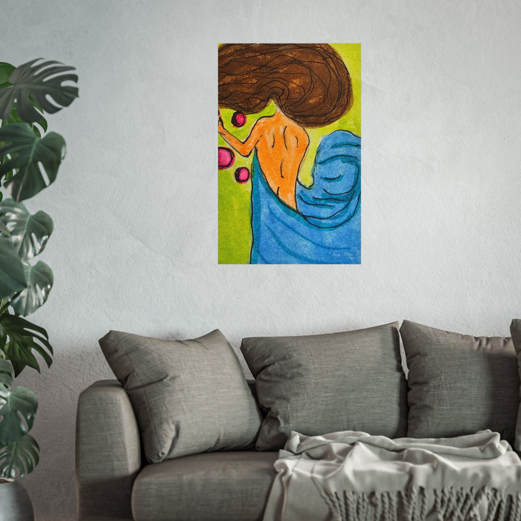 Abstract woman poster centered on wall above gray sofa, showing brown hair and blue drapery.