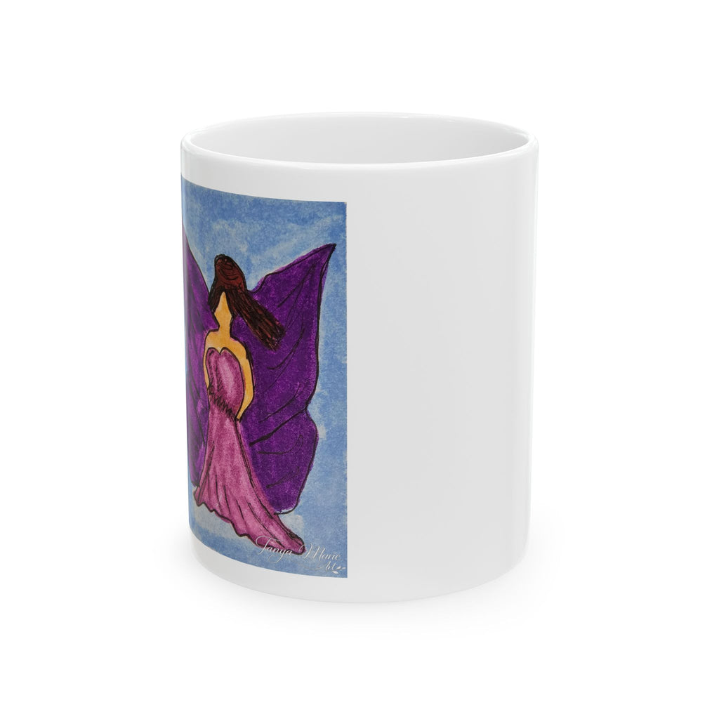 White ceramic mug with purple fairy illustration on the side