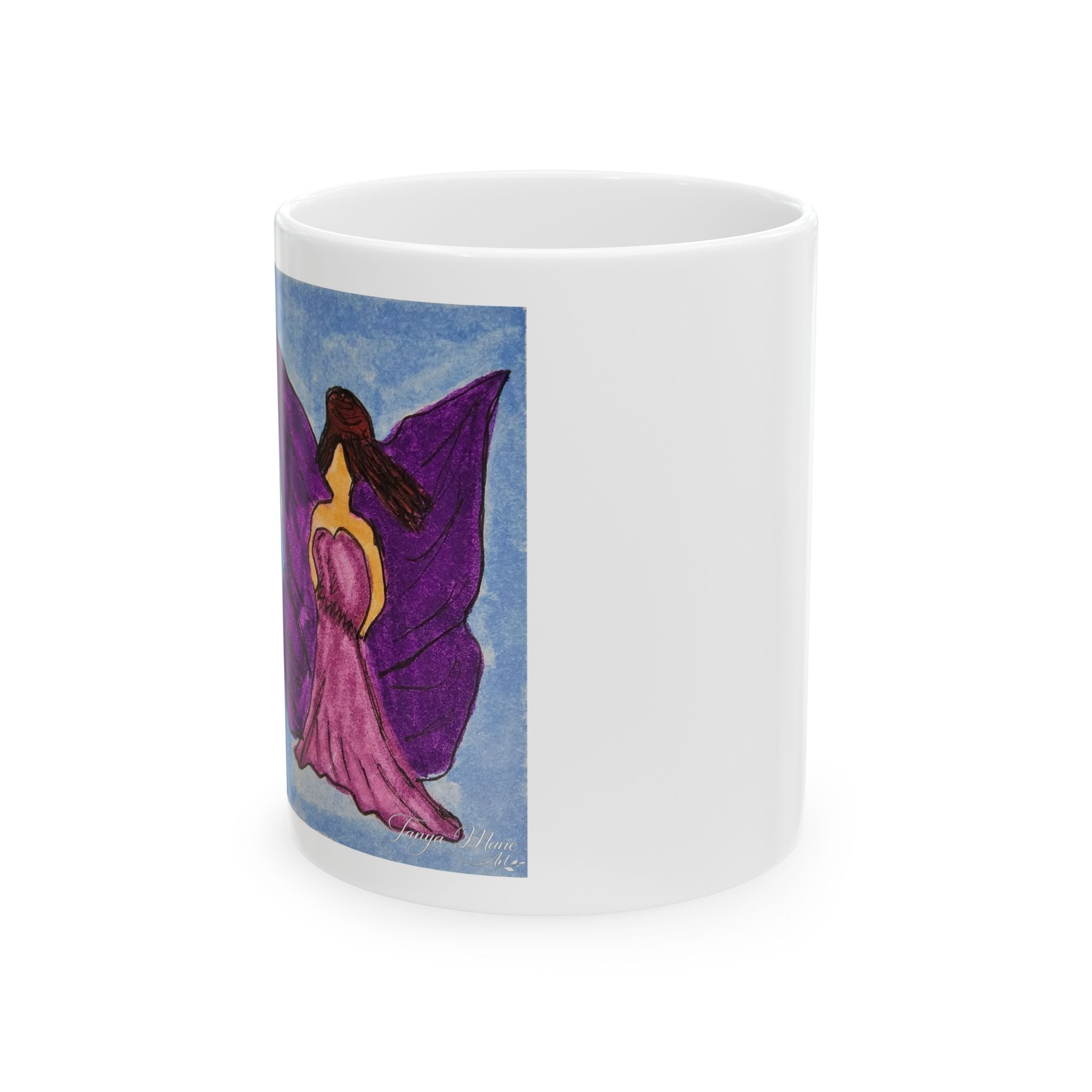 White ceramic mug with purple fairy illustration on the side