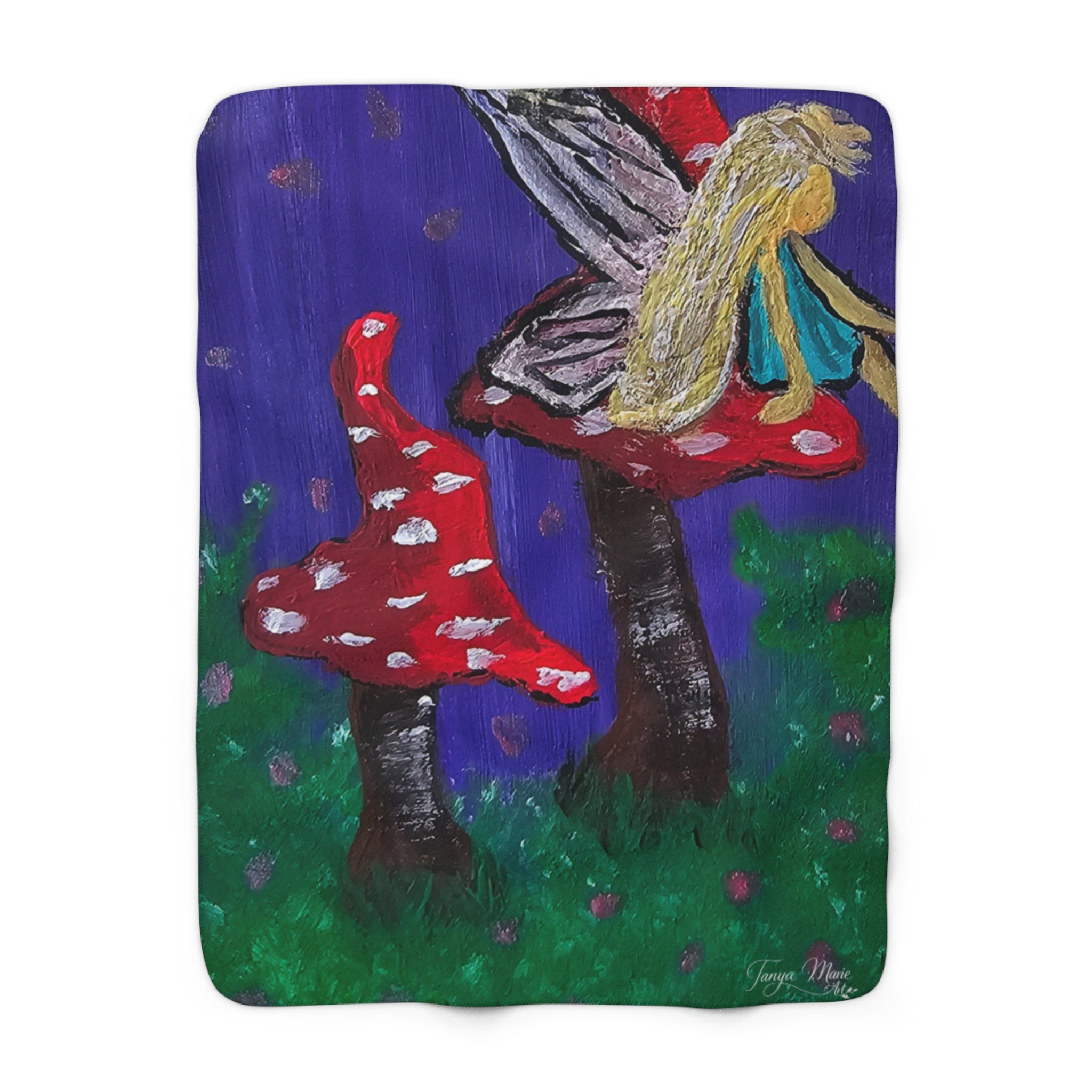 Sherpa fleece throw blanket with fairy tree, red mushrooms, and speckled details on purple