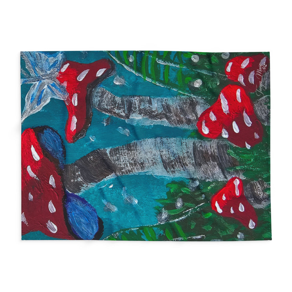 Fleece blanket panel close-up with red mushrooms over teal-blue and dark gray shapes