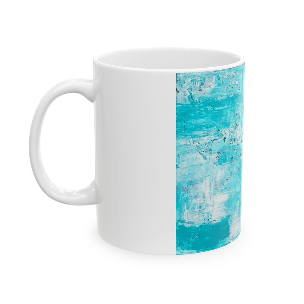 White ceramic mug with turquoise abstract side panel and round handle