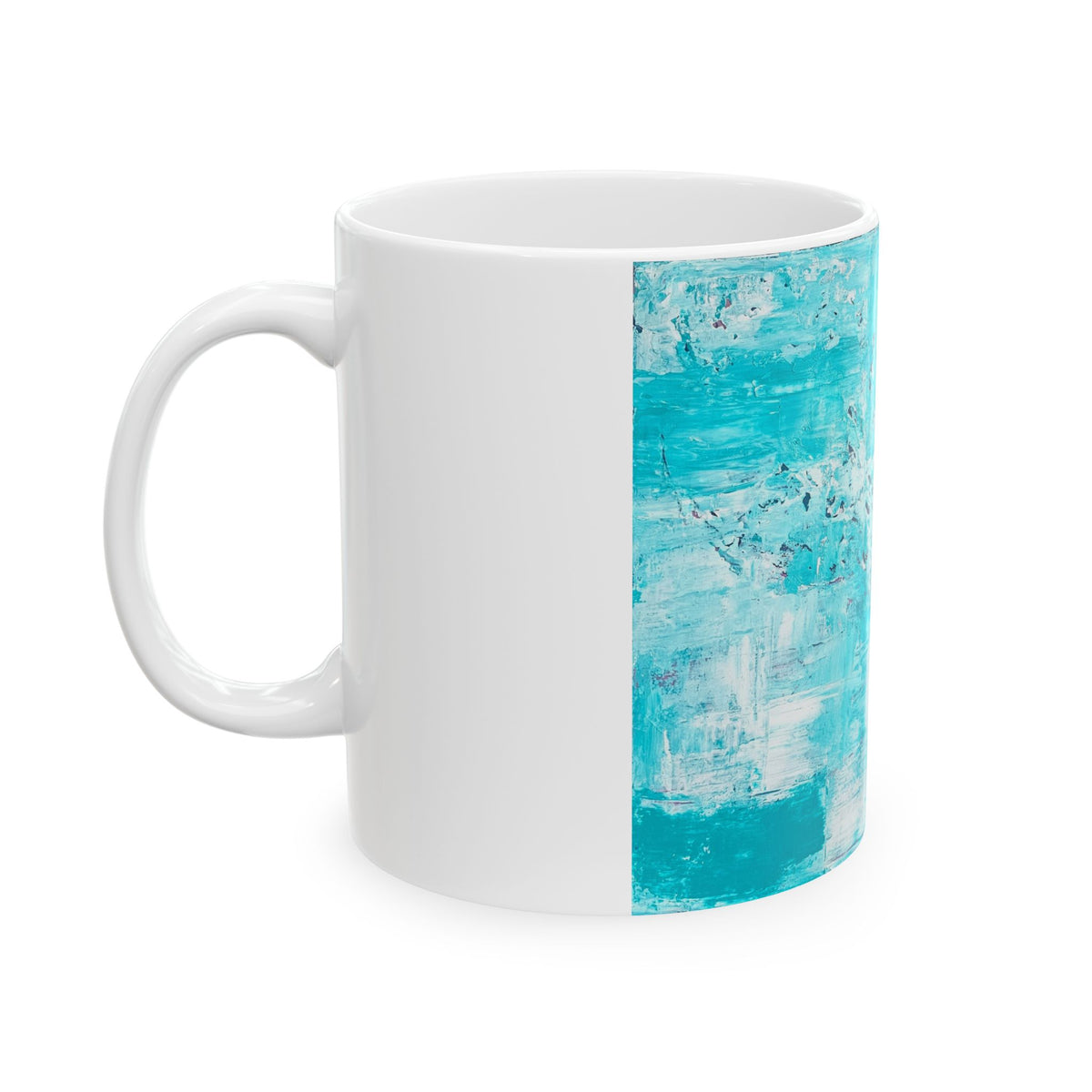 White ceramic mug with turquoise abstract side panel and round handle