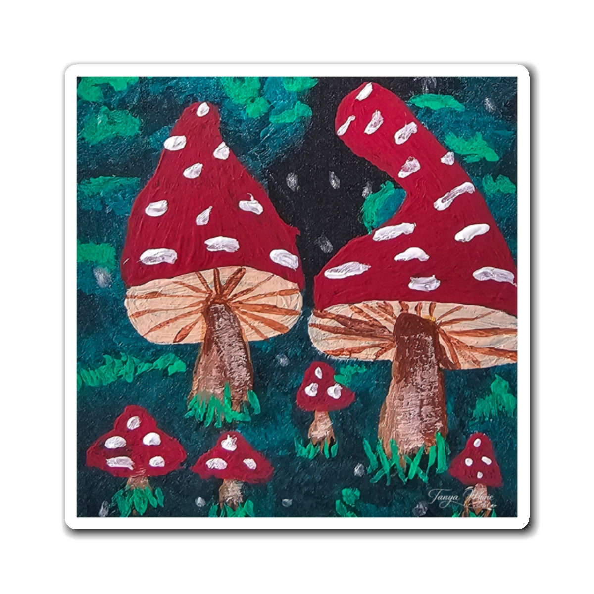 Forest toadstool magnet with red mushroom caps, white spots, and brown stems under dark foliage