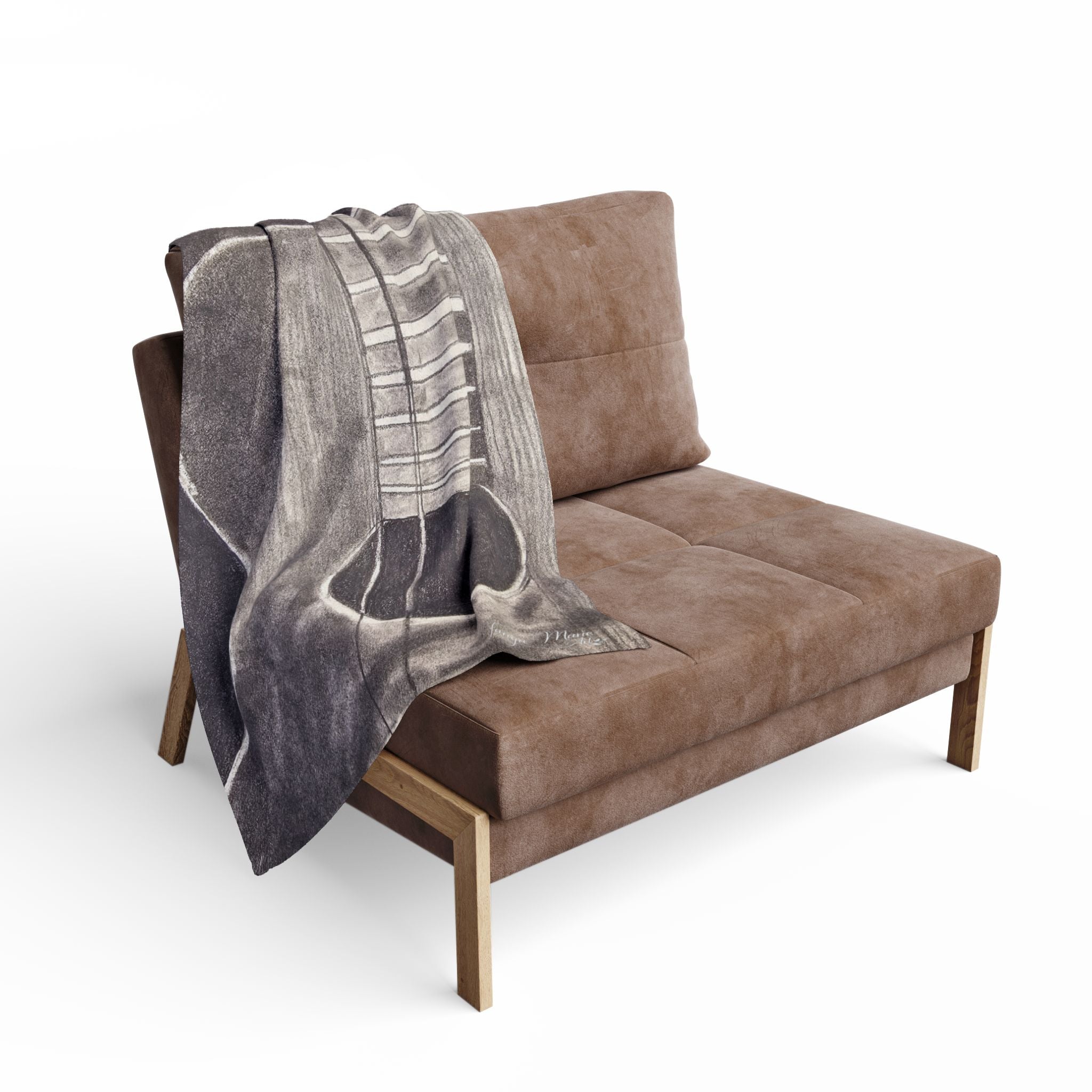 Gray acoustic guitar sketch fleece blanket draped over lounge chair, showing guitar body graphic