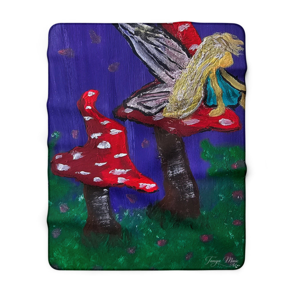 Sherpa fleece throw blanket, red mushrooms beside tall fairy tree on purple blue and green