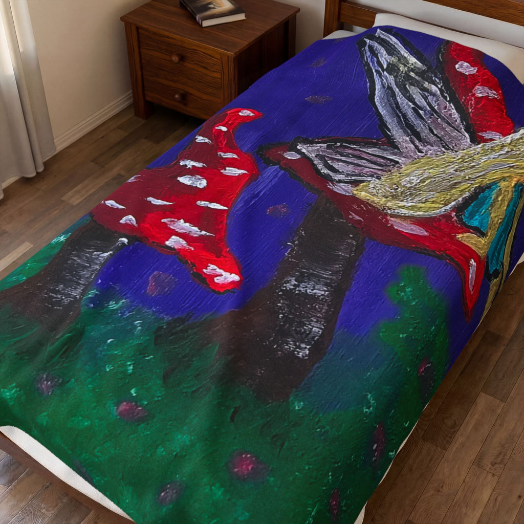 Plush velveteen blanket with vivid fairy and red toadstool pattern