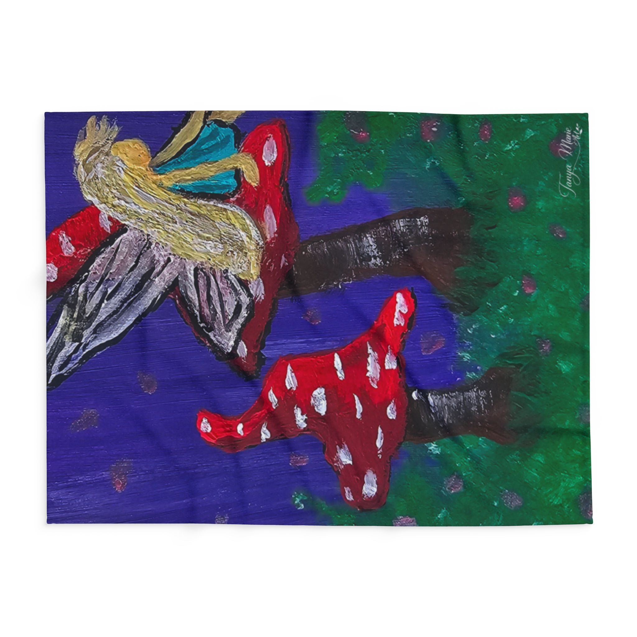 Fleece blanket print of fairy wings and red mushrooms under a blue and green scene