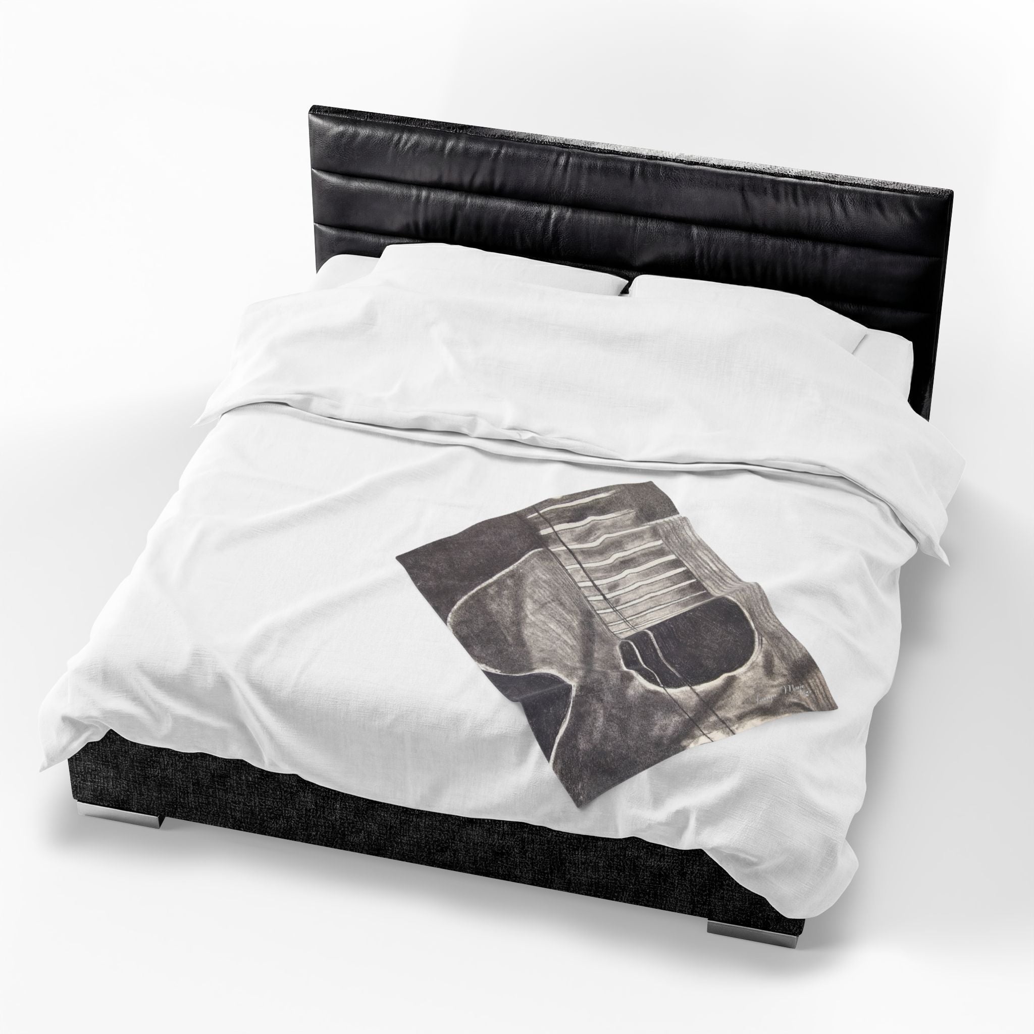 Plush blanket with acoustic guitar sketch graphic in dark gray on white bedding