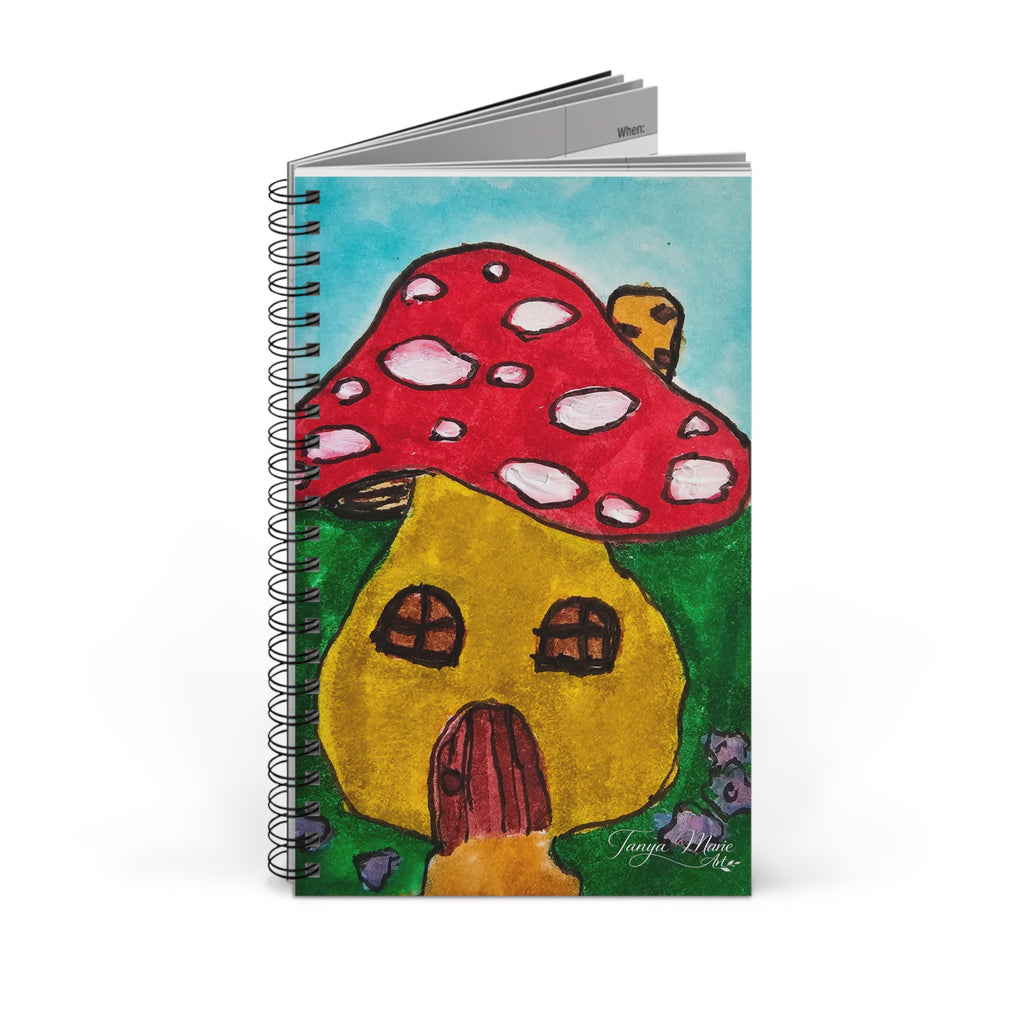 Spiral notebook cover with red mushroom and yellow cottage, black coil binding