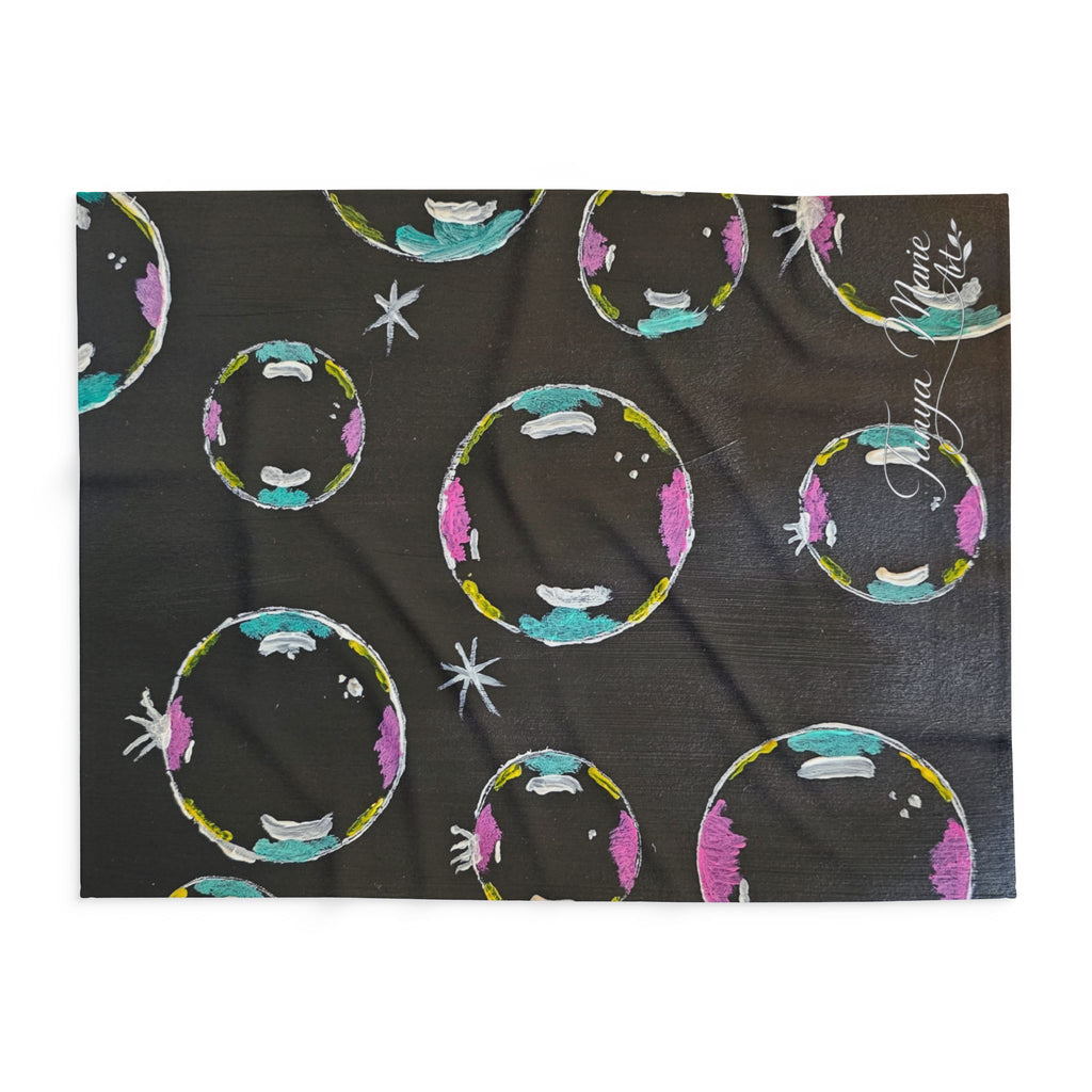 Fleece throw blanket, dark fabric with colorful bubble/planet circles and small white stars