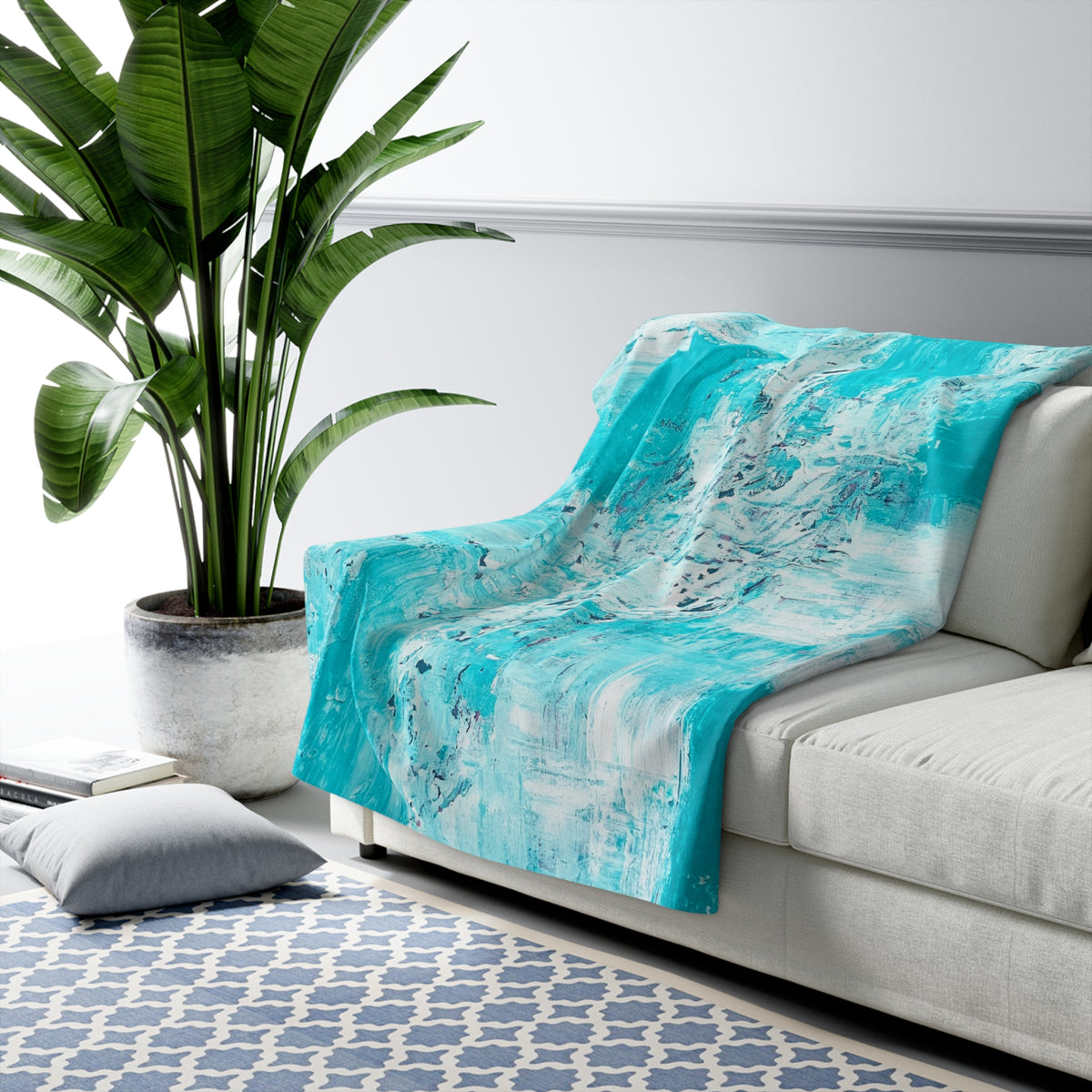 Turquoise abstract sherpa blanket with soft textured white-and-teal pattern