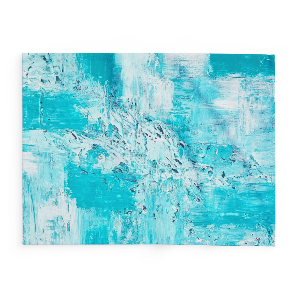 Turquoise abstract fleece blanket with wide blue and white patchwork effect.