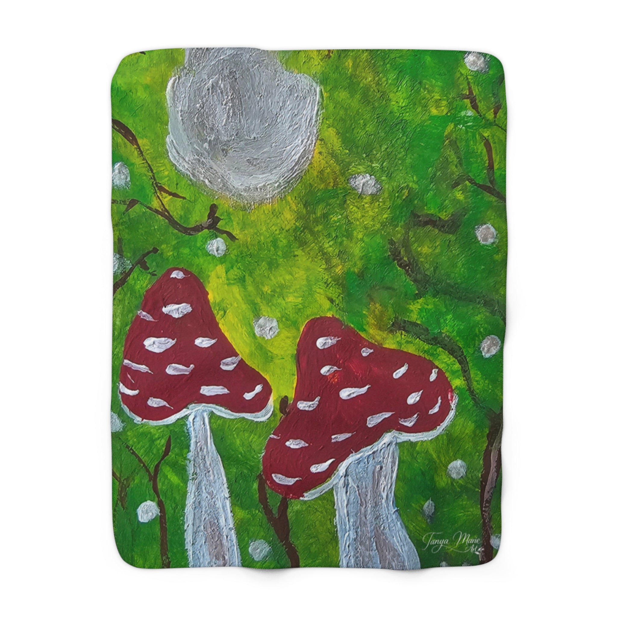 Sherpa blanket square featuring green forest, red mushrooms, and a large gray tree stump center