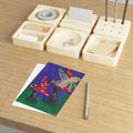 Whimsical fairy postcard with red mushroom on a blue night background