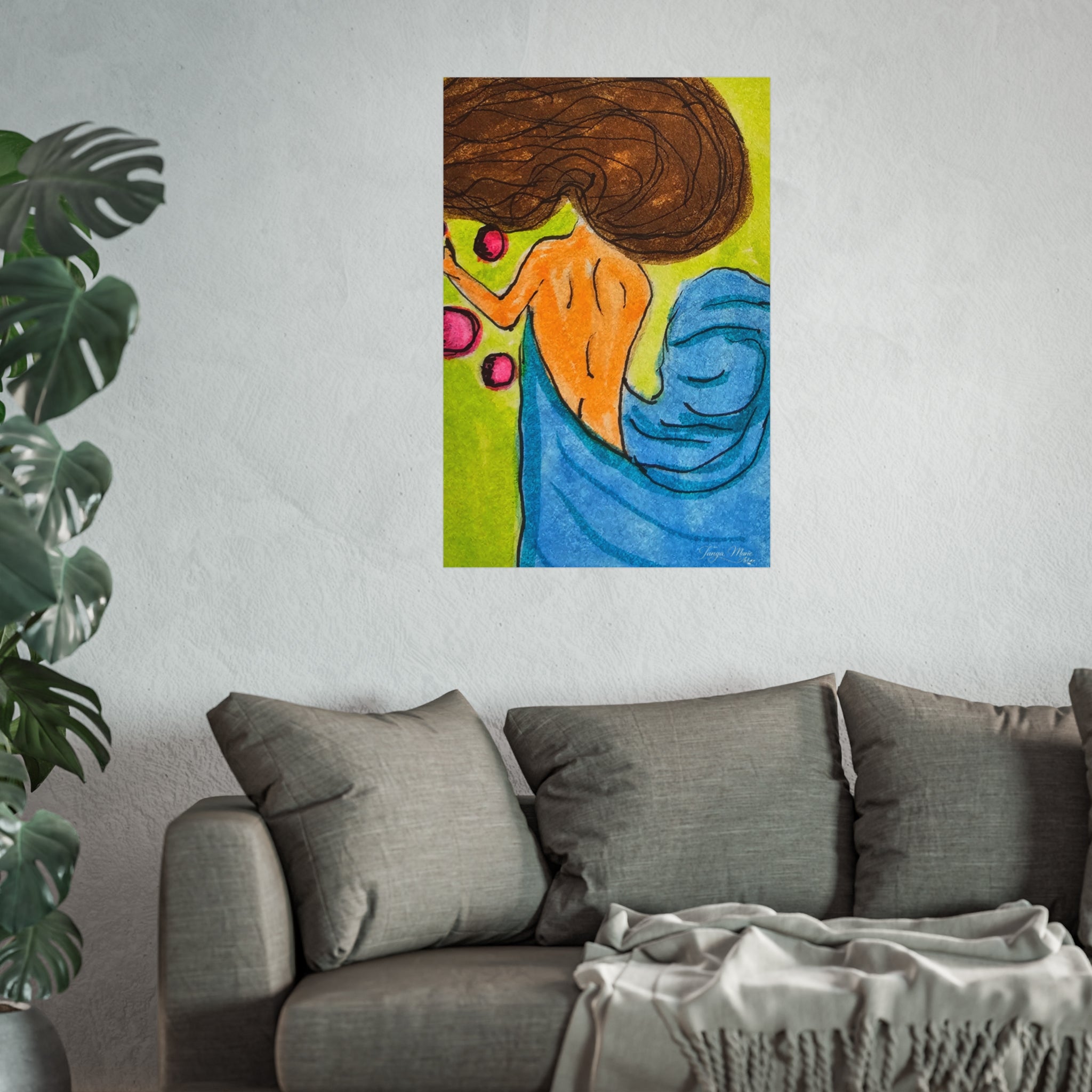 Abstract woman poster on wall above gray sofa, with brown hair and blue drapery.