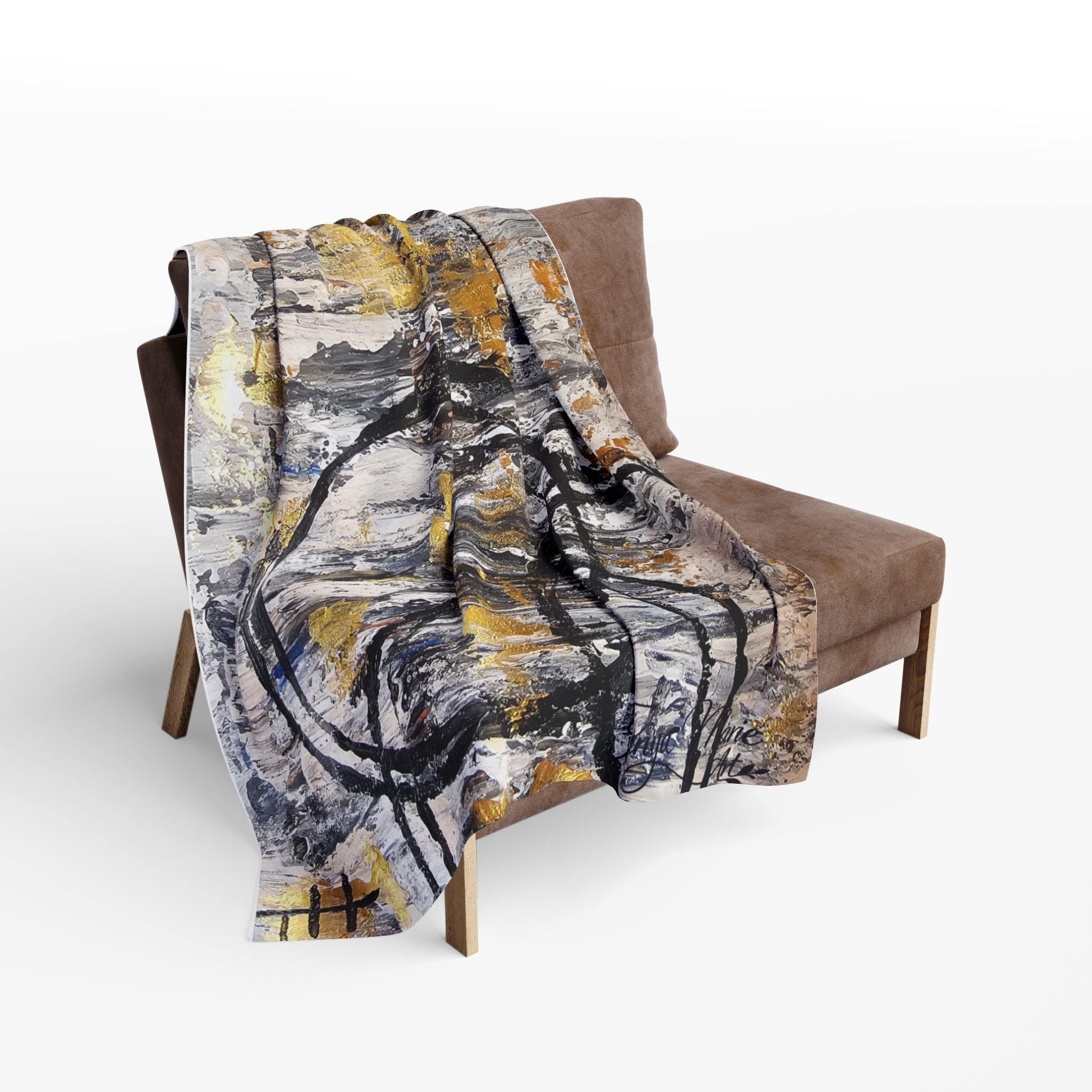 Abstract fleece throw blanket draped over chair, grey, white, black, and gold brush circles