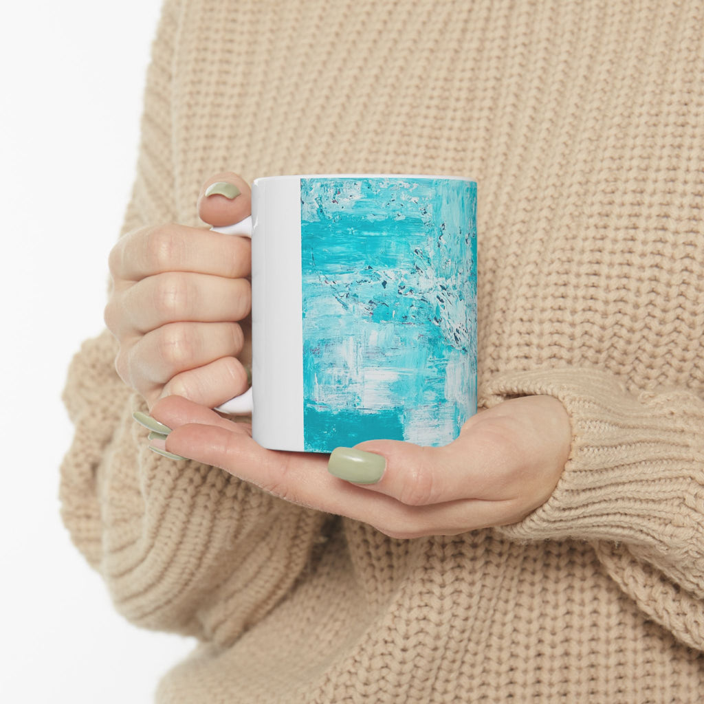 White ceramic mug with turquoise abstract ocean texture panel, 11 oz size