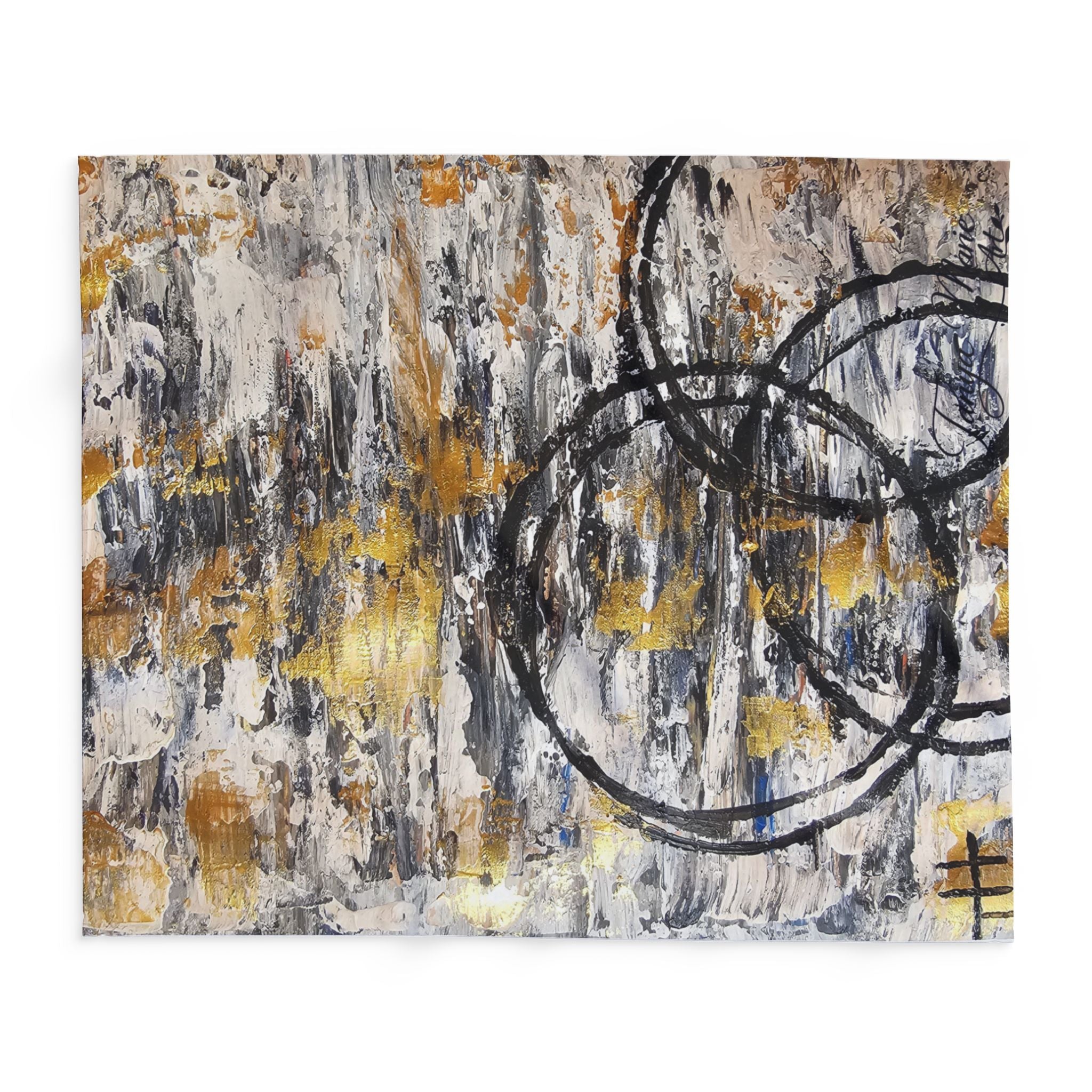 Abstract fleece blanket with grey, gold, and black circle artwork, laid flat