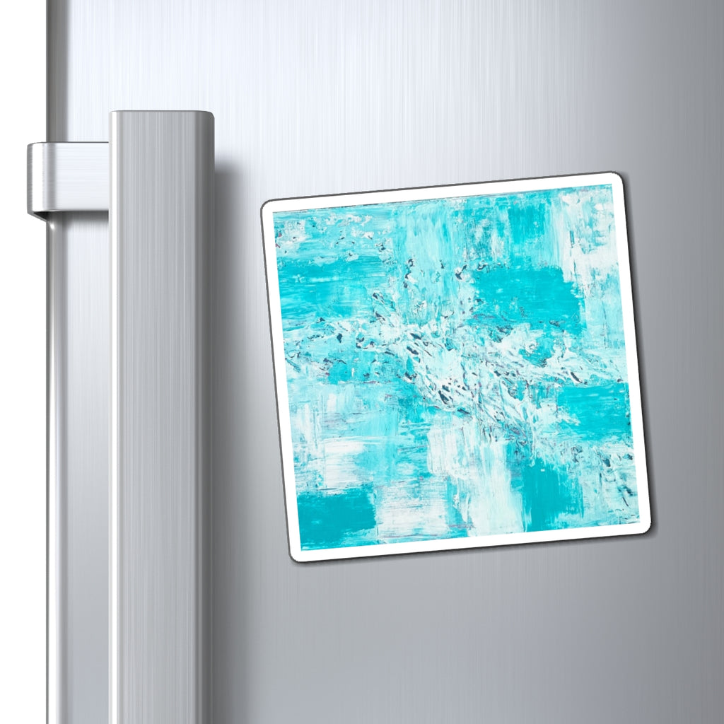 Ocean-blue abstract art magnet displayed on silver refrigerator door, teal and white splash