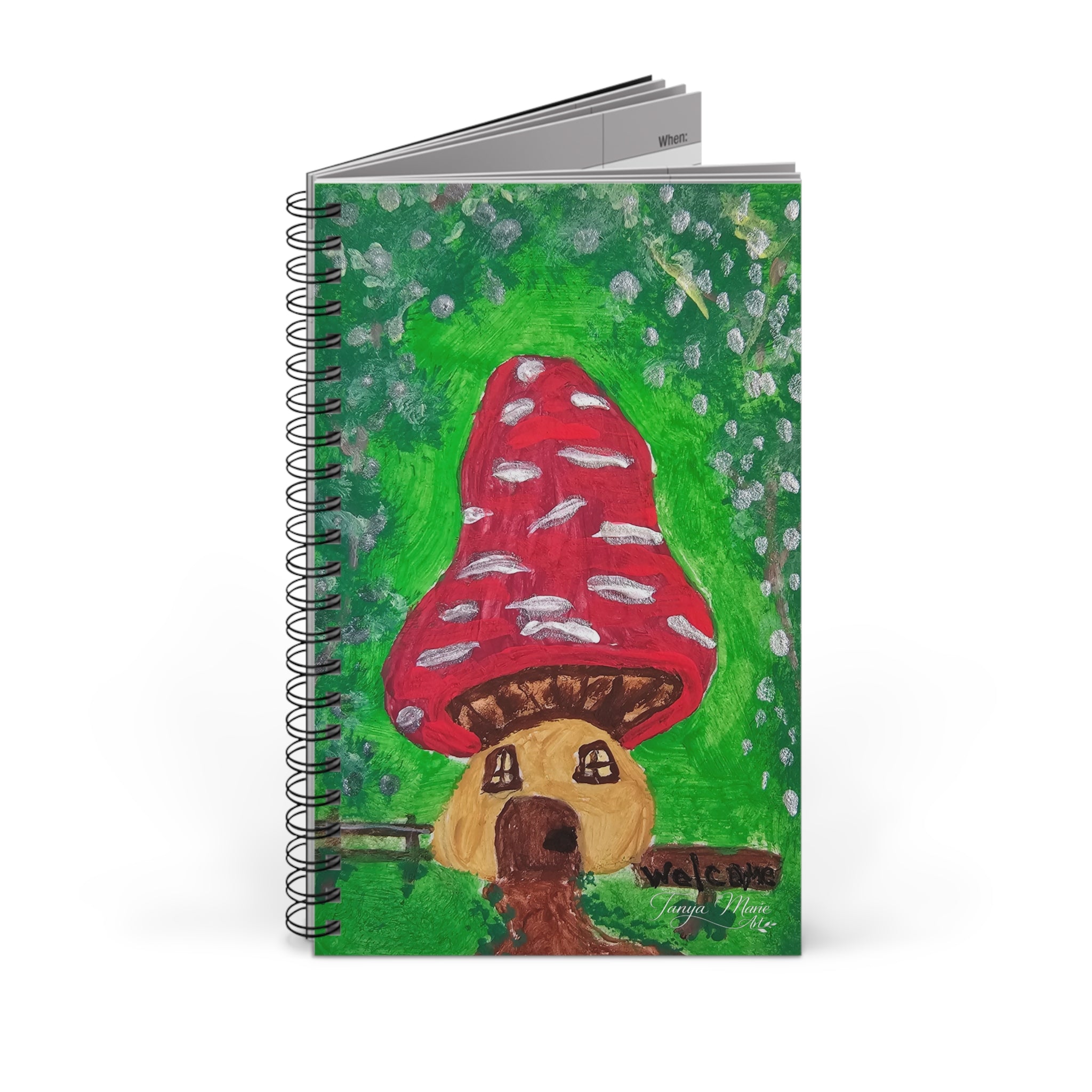Spiral journal front cover showing red mushroom over green background illustration