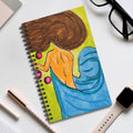Spiral journal with fantasy watercolor cover, woman portrait with brown hair, blue waves, green panel