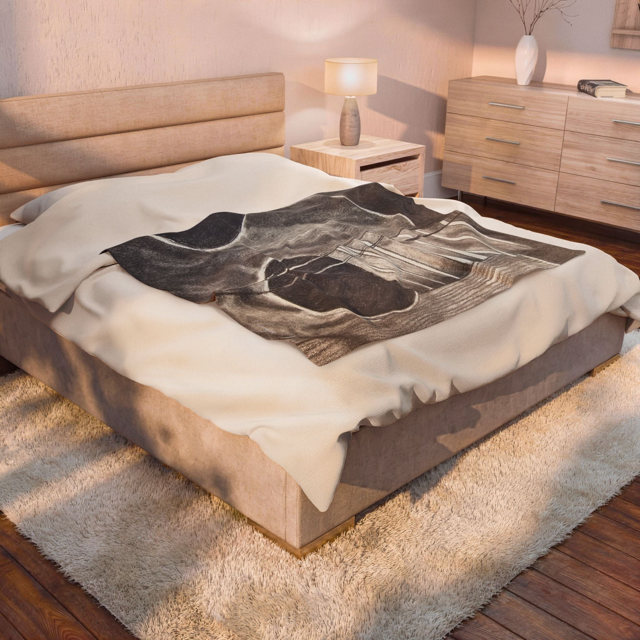 Plush blanket with acoustic guitar sketch graphic in dark gray on white bedding