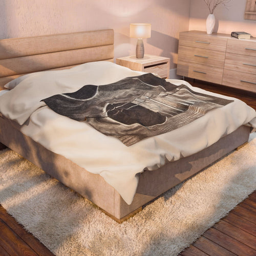 Plush blanket with acoustic guitar sketch graphic in dark gray on white bedding