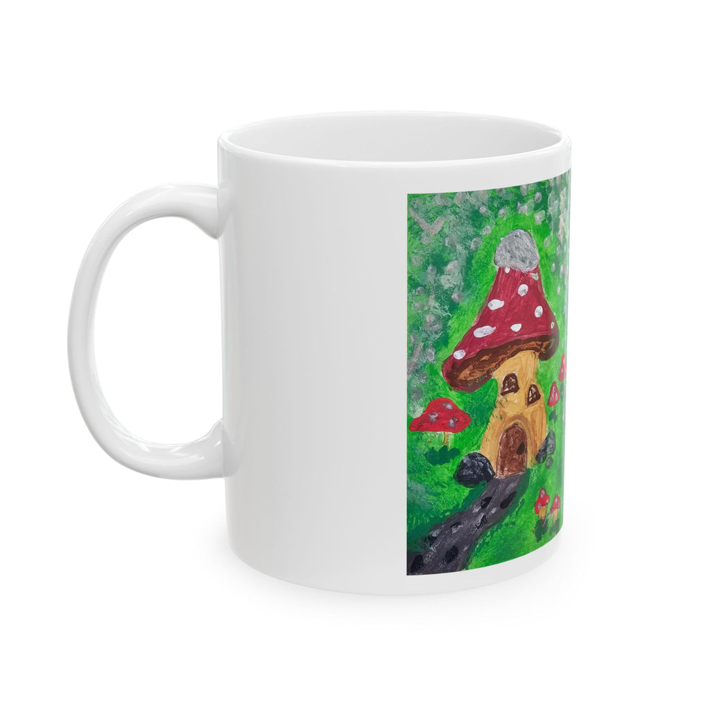 White ceramic mug with mushroom cottage scene illustration on side panel