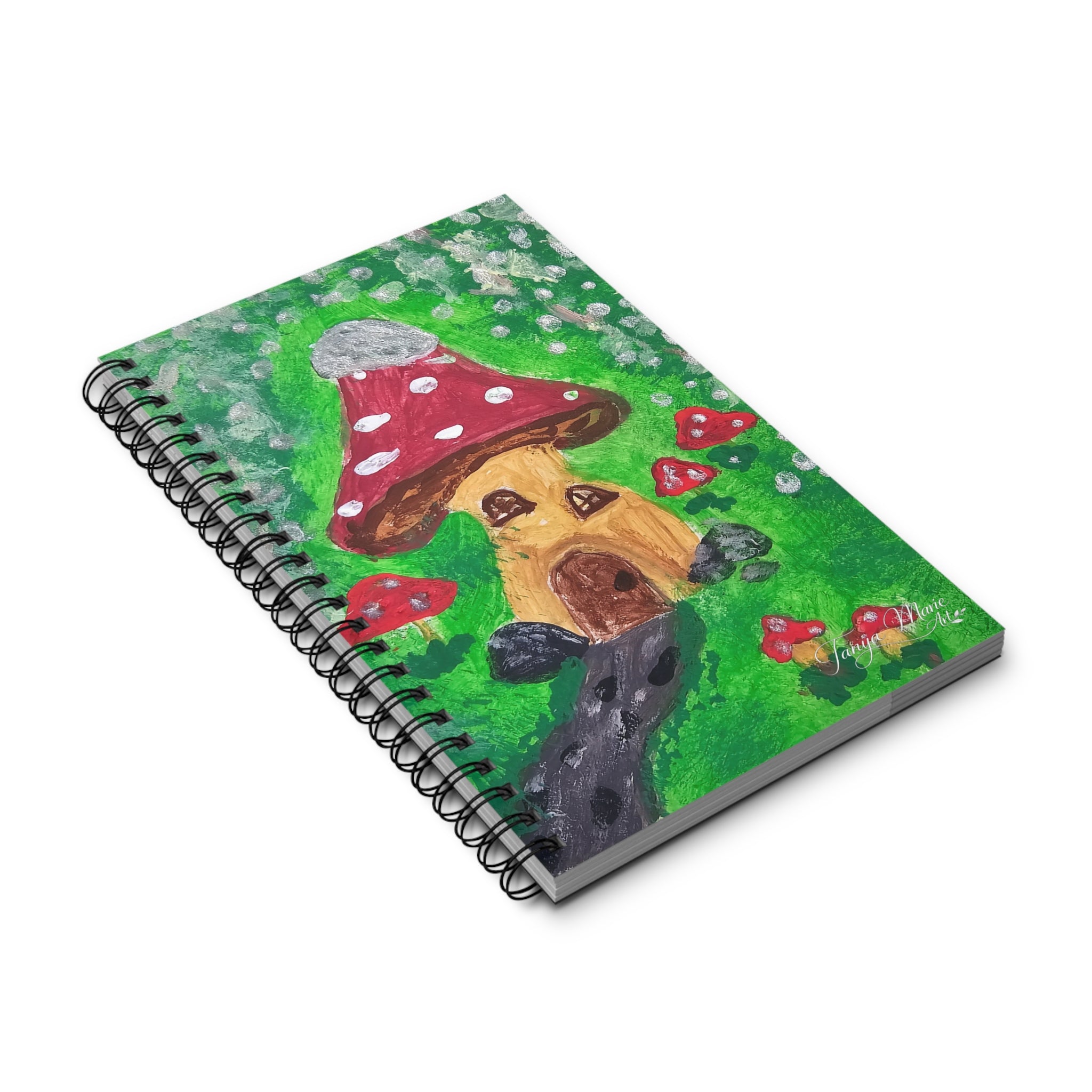 Spiral notebook with green mushroom house cover, red polka-cap and dark wire binding