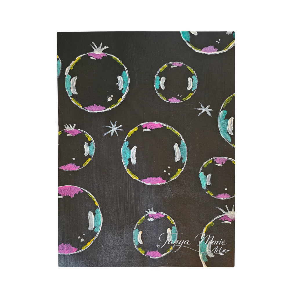 Black velveteen plush blanket with scattered colorful bubble ring motifs and stars