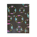 Black velveteen plush blanket with scattered colorful bubble ring motifs and stars
