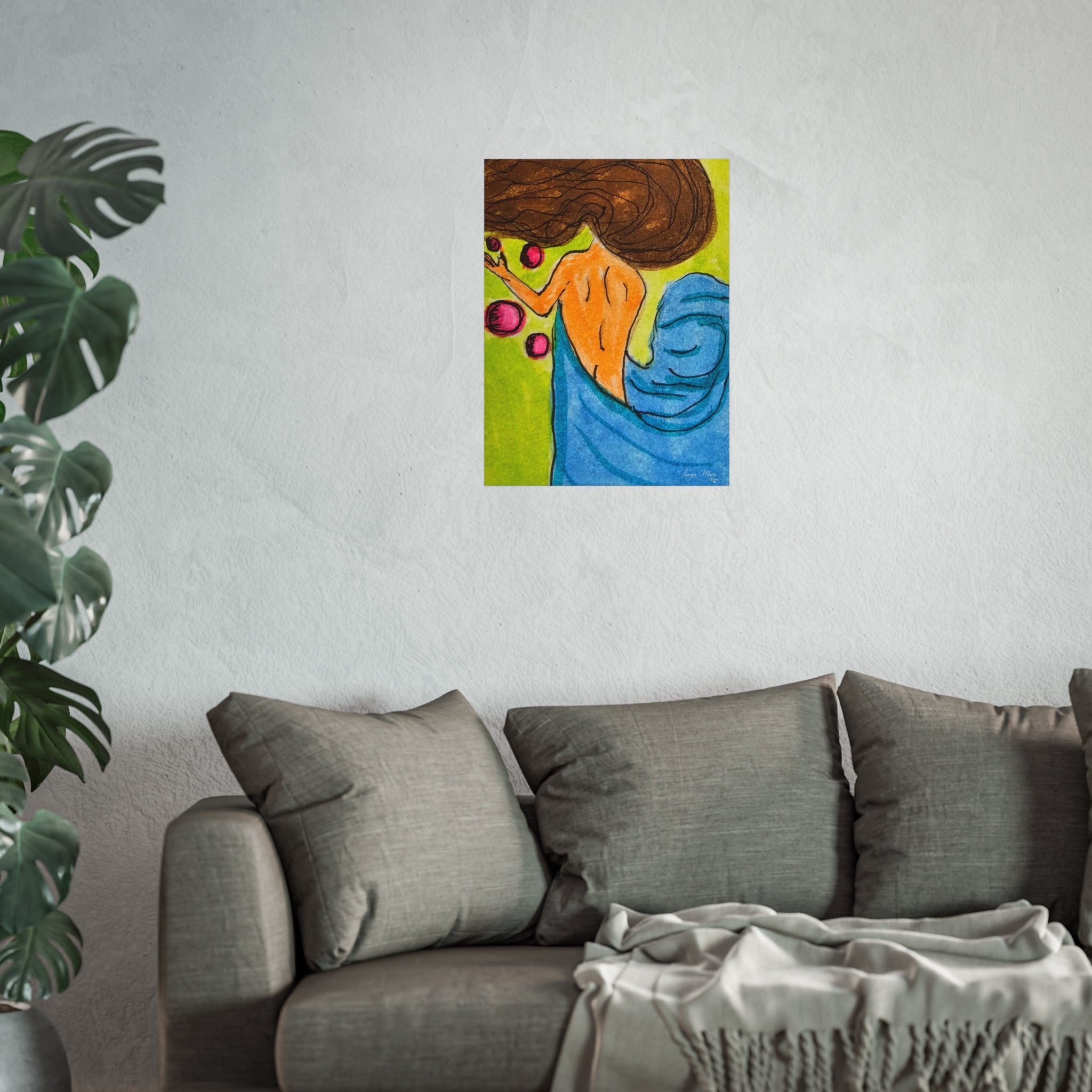 Matte abstract woman poster on wall above gray sofa, with blue drapery and magenta orbs.