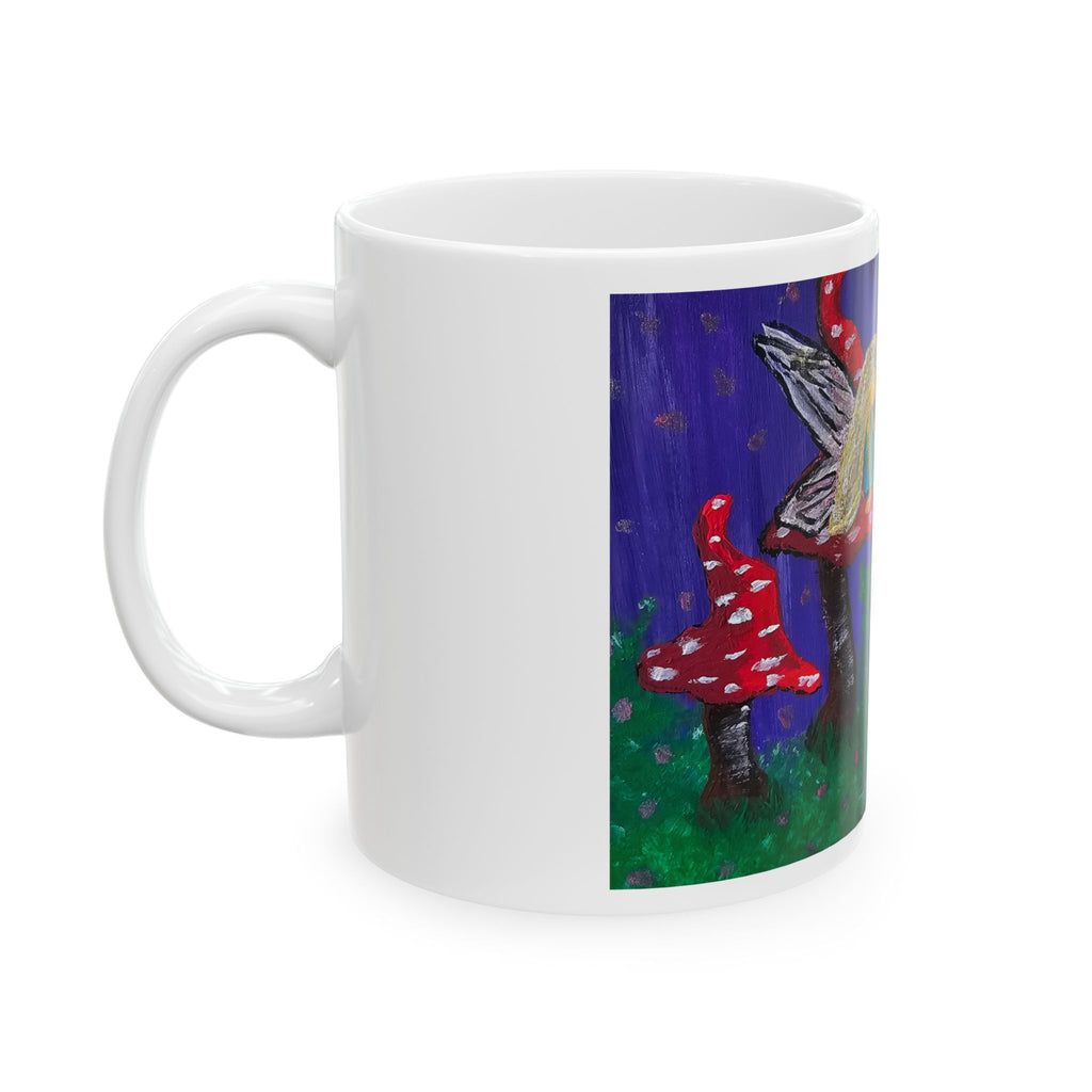 White ceramic mug with fairy and toadstool scene printed on front panel